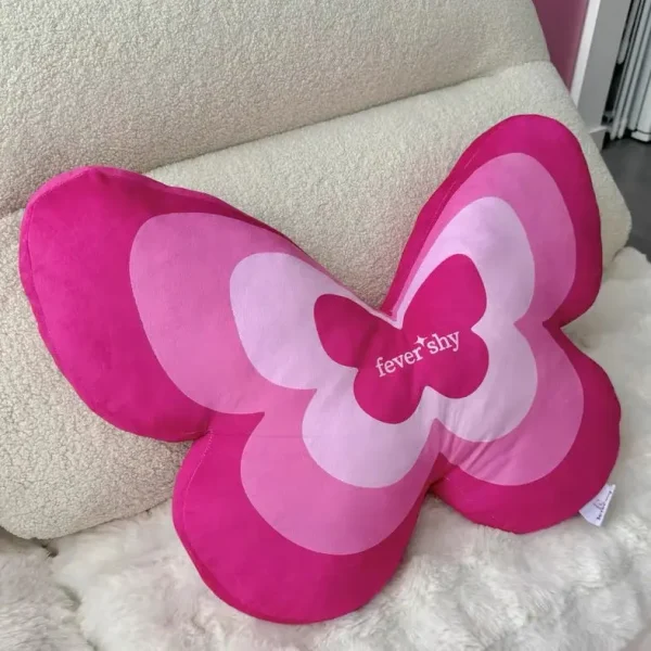 coussin papillon rose
